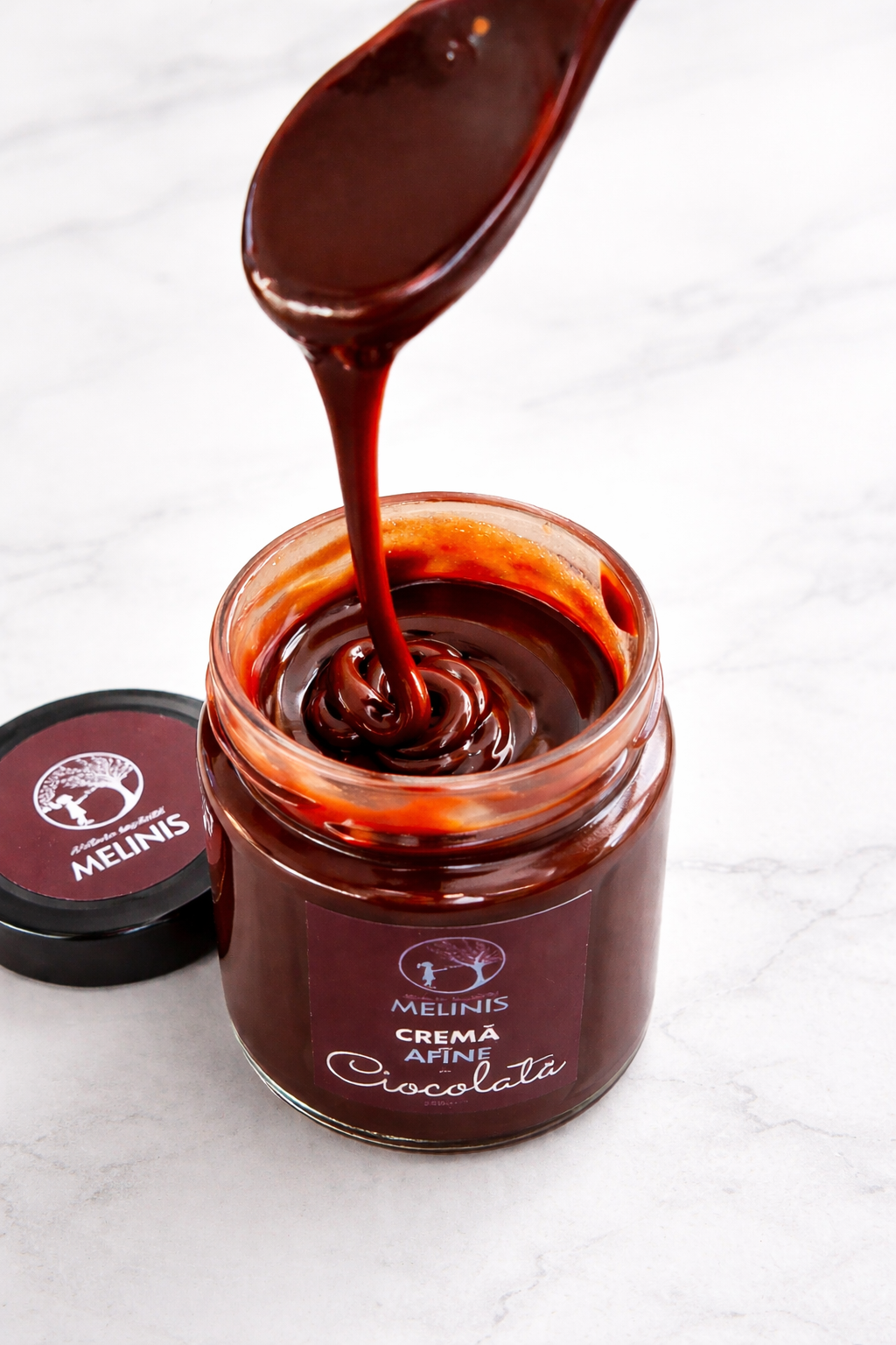 Melinis Afine cu Ciocolată Bean-to-Bar - Cremă tartinabilă din miere crudă, afine sălbatice ecologice și ciocolată 100% cacao